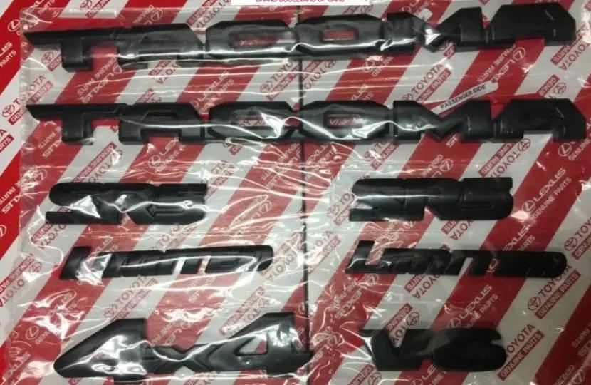 2016-2023 TOYOTA TACOMA BLACKOUT EMBLEM OVERLAY KIT GENUINE OEM PT948-35180-02 Fastpartz